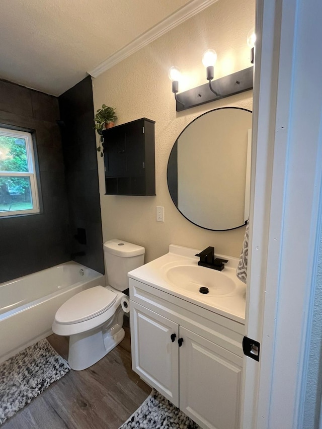 412 Sands Ct, White Settlement, TX 76108 - full bathroom with wood finished floors, vanity, toilet, crown molding, and shower / tub combination