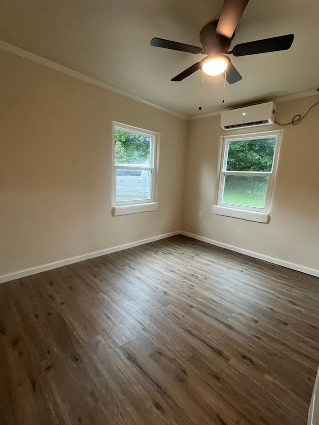 412 Sands Ct, White Settlement, TX 76108 - empty room featuring a wall mounted AC, ornamental molding, dark wood-style floors, ceiling fan, and baseboards