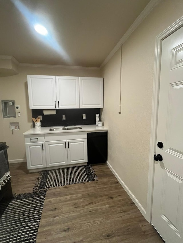 412 Sands Ct, White Settlement, TX 76108 - kitchen featuring a sink, black dishwasher, ornamental molding, baseboards, and white cabinetry