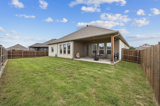 2293 High Plain Ln, Waxahachie, TX 75167 - back of property with a patio area and a shingled roof
