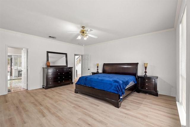 3936 Gillespie Dr, Carrollton, TX 75010 - bedroom featuring wood finished floors, crown molding, baseboards, and ceiling fan