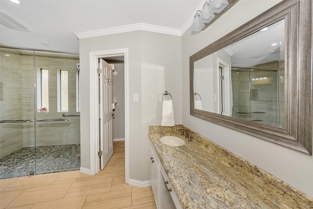 1113 Yorkshire Dr, Carrollton, TX 75007 - full bath featuring crown molding, vanity, a stall shower, and baseboards