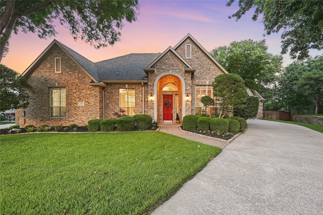 1403 Chelsea Cir, Southlake, TX 76092 - traditional home featuring brick siding, roof with shingles, and driveway