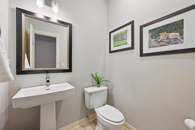1403 Chelsea Cir, Southlake, TX 76092 - bathroom featuring toilet and baseboards