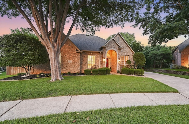 1403 Chelsea Cir, Southlake, TX 76092 - view of front of house featuring a yard, brick siding, concrete driveway, and roof with shingles