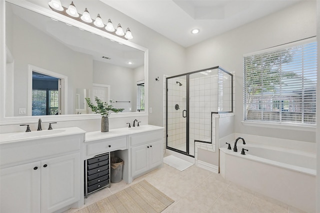 1403 Chelsea Cir, Southlake, TX 76092 - bathroom featuring a stall shower, double vanity, a garden tub, tile patterned flooring, and recessed lighting