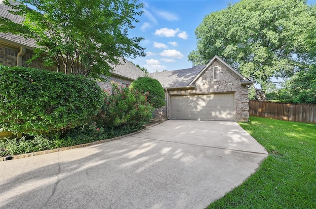 1403 Chelsea Cir, Southlake, TX 76092 - view of front of property featuring concrete driveway, brick siding, and an attached garage