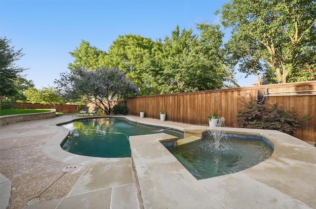 1403 Chelsea Cir, Southlake, TX 76092 - view of pool with a fenced backyard, a pool with connected hot tub, and a patio