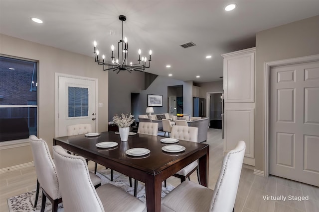 14548 Blakehill Dr, Frisco, TX 75035 - dining space featuring a chandelier, baseboards, and recessed lighting