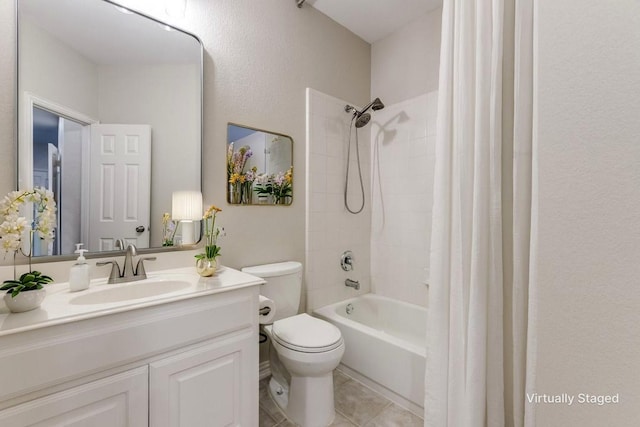 14548 Blakehill Dr, Frisco, TX 75035 - bathroom with toilet, vanity, shower / bath combo with shower curtain, and tile patterned floors