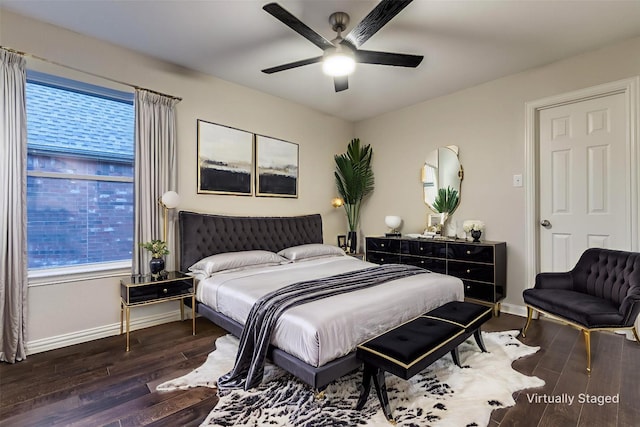 14548 Blakehill Dr, Frisco, TX 75035 - bedroom featuring baseboards, wood finished floors, multiple windows, and ceiling fan