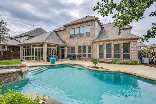 5014 Toledo Bend Dr, Frisco, TX 75033 - view of swimming pool featuring a sunroom, grilling area, a fenced backyard, a patio, and a pool with connected hot tub
