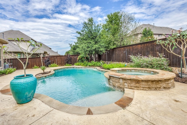 5014 Toledo Bend Dr, Frisco, TX 75033 - view of pool with a fenced backyard, a pool with connected hot tub, and a patio area