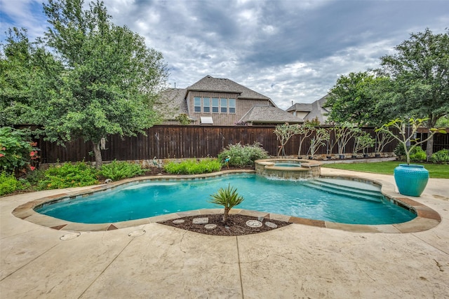 5014 Toledo Bend Dr, Frisco, TX 75033 - view of pool with a fenced backyard, a patio, and a pool with connected hot tub