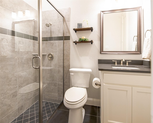 2624 Seabiscuit Rd, Celina, TX 75009 - bathroom featuring toilet, vanity, a shower stall, and tile patterned flooring