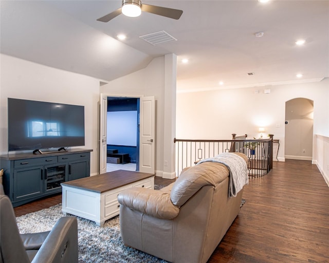 2624 Seabiscuit Rd, Celina, TX 75009 - living room with ceiling fan, dark wood finished floors, arched walkways, lofted ceiling, and baseboards