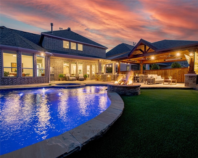 2624 Seabiscuit Rd, Celina, TX 75009 - view of swimming pool with an outdoor living space with a fire pit, a patio, and a pool with connected hot tub