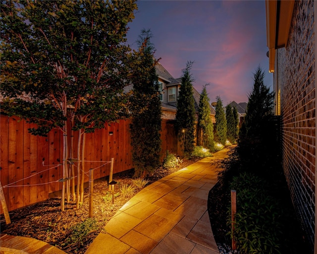 2624 Seabiscuit Rd, Celina, TX 75009 - yard at dusk featuring a patio