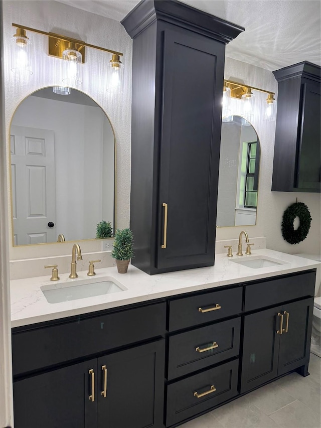 440 Mohican Ln, Shreveport, LA 71106 - bathroom featuring double vanity and tile patterned flooring