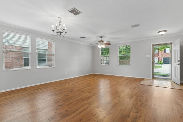 1812 Elk Lake Trl, Justin, TX 76247 - empty room with crown molding, a chandelier, light wood-style flooring, ceiling fan, and baseboards