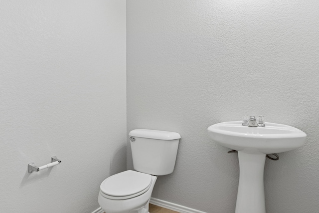 1812 Elk Lake Trl, Justin, TX 76247 - bathroom featuring toilet and baseboards