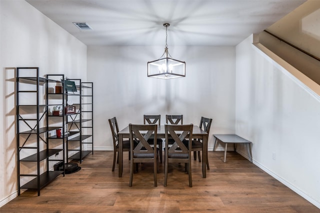 1601 Pecan Orchard Dr, Princeton, TX 75407 - dining room featuring wood finished floors, a chandelier, and baseboards