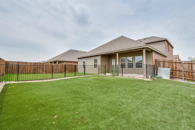 1601 Pecan Orchard Dr, Princeton, TX 75407 - rear view of house featuring roof with shingles and brick siding