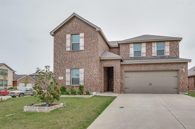 1601 Pecan Orchard Dr, Princeton, TX 75407 - traditional home featuring brick siding, concrete driveway, a front yard, an attached garage, and roof with shingles