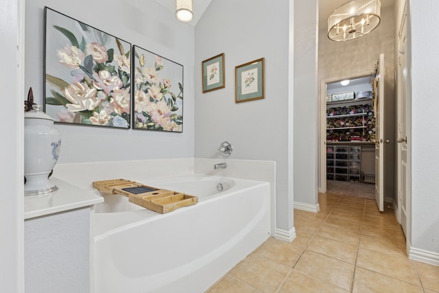 816 Claycourt Cir, Fort Worth, TX 76120 - full bathroom featuring tile patterned floors, a bath, and baseboards