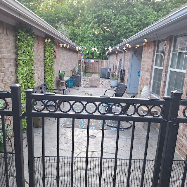 816 Claycourt Cir, Fort Worth, TX 76120 - view of patio featuring central air condition unit