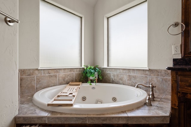 14208 Lucille Dr, Newark, TX 76071 - bathroom with a jetted tub and a textured wall