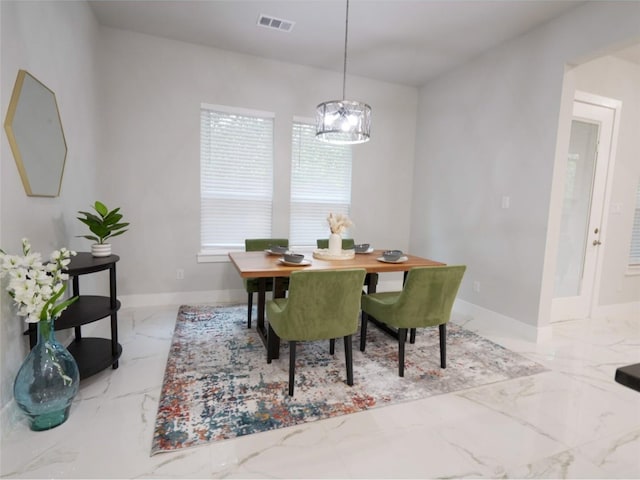2217 S Peachtree Ct, Denison, TX 75020 - dining room with marble finish flooring and baseboards