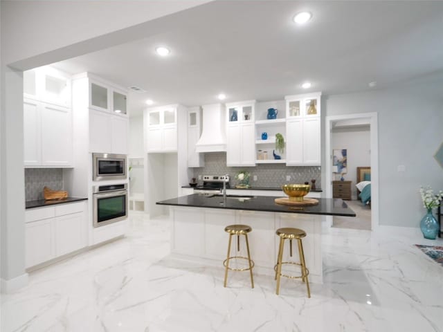 2217 S Peachtree Ct, Denison, TX 75020 - kitchen featuring stainless steel appliances, premium range hood, open shelves, decorative backsplash, and recessed lighting