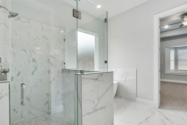 2217 S Peachtree Ct, Denison, TX 75020 - bathroom with a marble finish shower, a freestanding bath, baseboards, marble finish floors, and ceiling fan