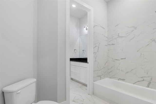 2217 S Peachtree Ct, Denison, TX 75020 - bathroom with marble look tiles, toilet, vanity, and shower / bathtub combination