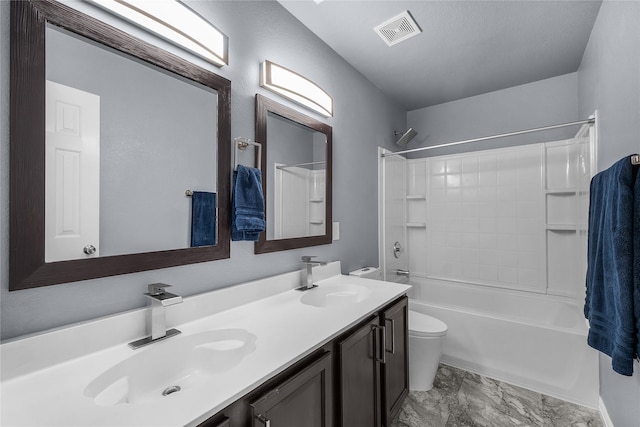 8002 Stowe Springs Ln, Arlington, TX 76002 - bathroom featuring toilet, double vanity, shower / bathtub combination, and marble finish floors