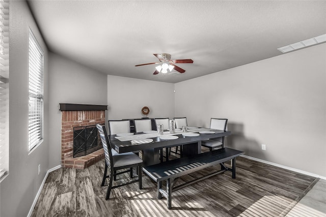 8002 Stowe Springs Ln, Arlington, TX 76002 - dining room with baseboards, ceiling fan, wood finished floors, plenty of natural light, and a textured ceiling