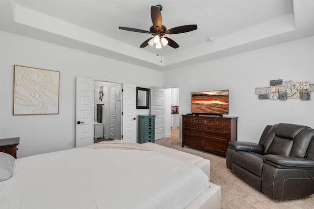 2603 Loxley Dr, Mansfield, TX 76084 - bedroom featuring a tray ceiling, light carpet, and a ceiling fan