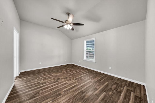 209 NE 6th Ave, Mineral Wells, TX 76067 - spare room with ceiling fan, lofted ceiling, dark wood-style floors, and baseboards