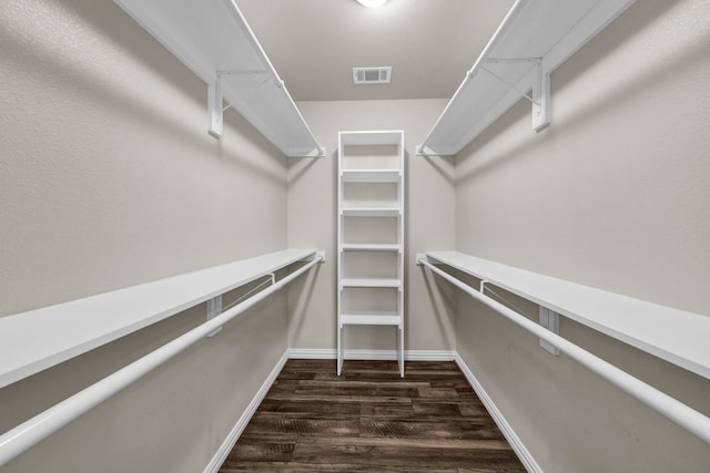 209 NE 6th Ave, Mineral Wells, TX 76067 - spacious closet with dark wood finished floors