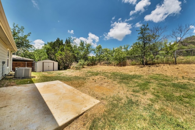 209 NE 6th Ave, Mineral Wells, TX 76067 - view of yard featuring central AC unit and a patio