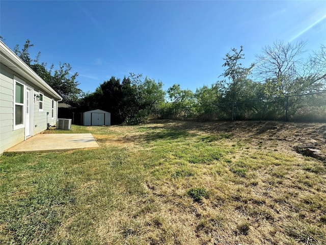 209 NE 6th Ave, Mineral Wells, TX 76067 - view of yard featuring central AC unit and a patio area