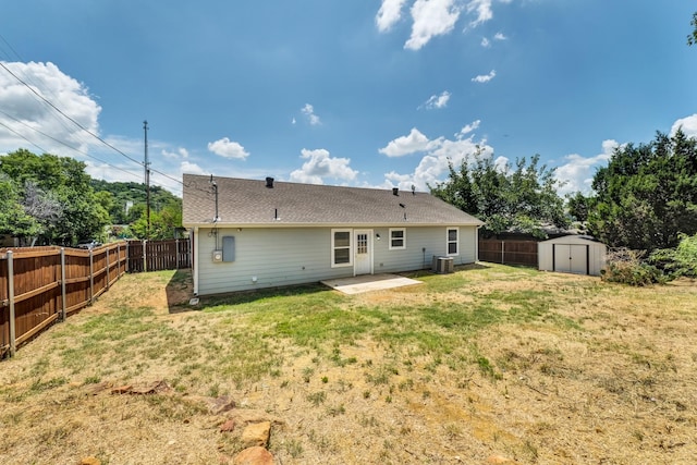 209 NE 6th Ave, Mineral Wells, TX 76067 - rear view of house with central AC and a patio