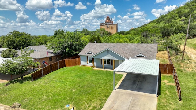 209 NE 6th Ave, Mineral Wells, TX 76067 - view of front of house featuring driveway and a carport