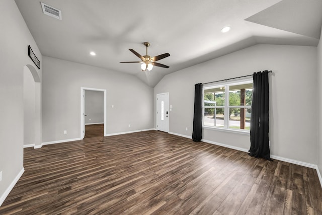 209 NE 6th Ave, Mineral Wells, TX 76067 - unfurnished living room featuring dark wood-style floors, ceiling fan, vaulted ceiling, arched walkways, and recessed lighting