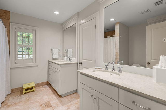 3766 W 4th St, Fort Worth, TX 76107 - full bath featuring two vanities, baseboards, recessed lighting, and a shower with curtain
