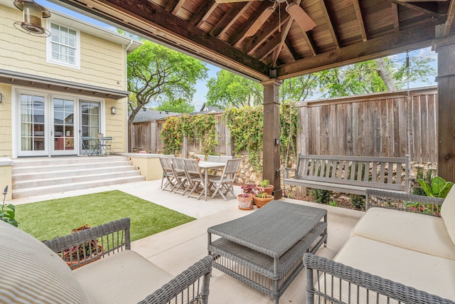 3766 W 4th St, Fort Worth, TX 76107 - fenced backyard with a patio area, outdoor dining area, and french doors