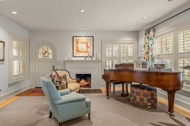 3766 W 4th St, Fort Worth, TX 76107 - living area with healthy amount of natural light, a fireplace with flush hearth, baseboards, and recessed lighting