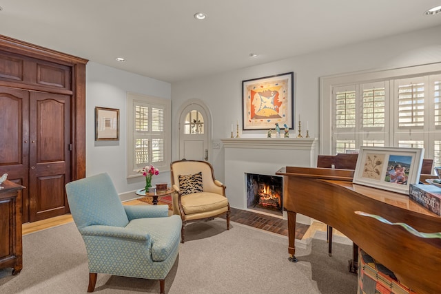 3766 W 4th St, Fort Worth, TX 76107 - living area featuring a warm lit fireplace, carpet, recessed lighting, and baseboards