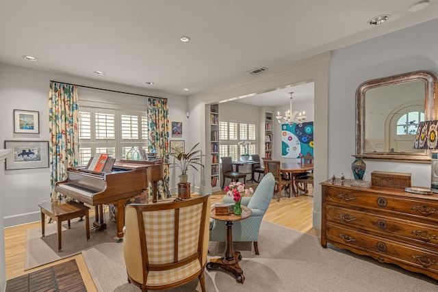 3766 W 4th St, Fort Worth, TX 76107 - living area with a chandelier, wood finished floors, recessed lighting, and baseboards